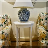 F87. Contemporary white end table. 